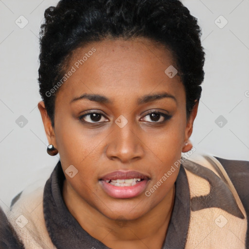 Joyful black young-adult female with short  brown hair and brown eyes