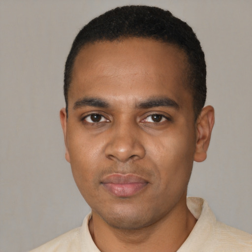 Neutral black young-adult male with short  black hair and brown eyes