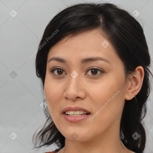 Joyful asian young-adult female with medium  brown hair and brown eyes