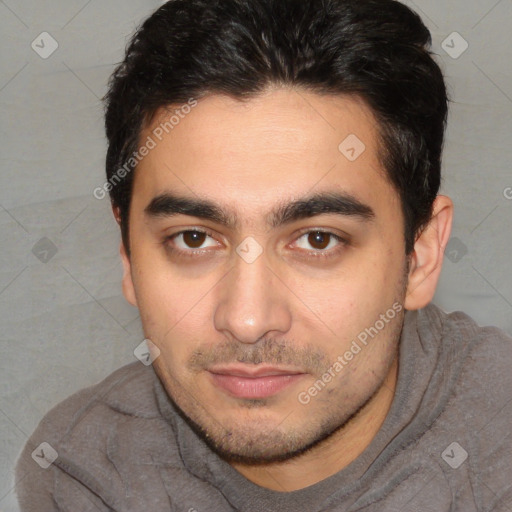 Joyful white young-adult male with short  black hair and brown eyes