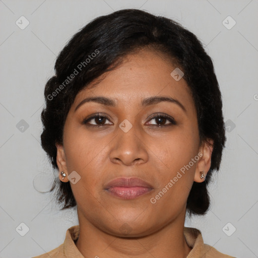 Joyful latino young-adult female with medium  brown hair and brown eyes