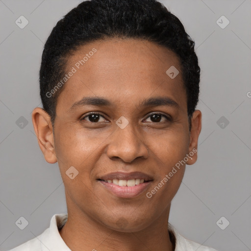 Joyful black young-adult male with short  black hair and brown eyes