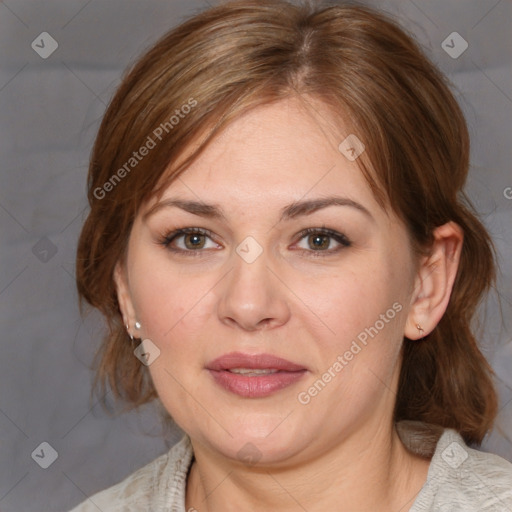 Joyful white adult female with medium  brown hair and brown eyes