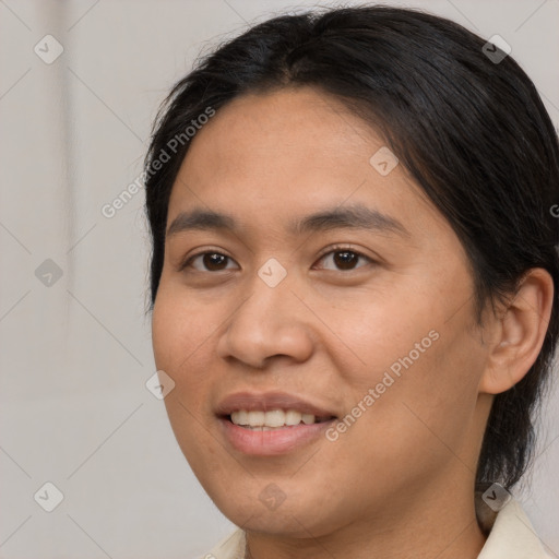 Joyful asian young-adult female with medium  brown hair and brown eyes