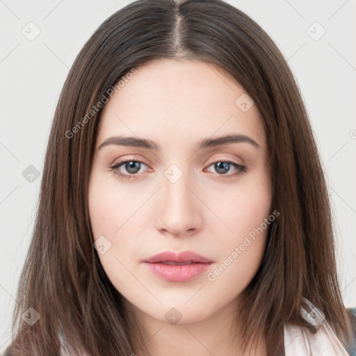 Neutral white young-adult female with long  brown hair and brown eyes