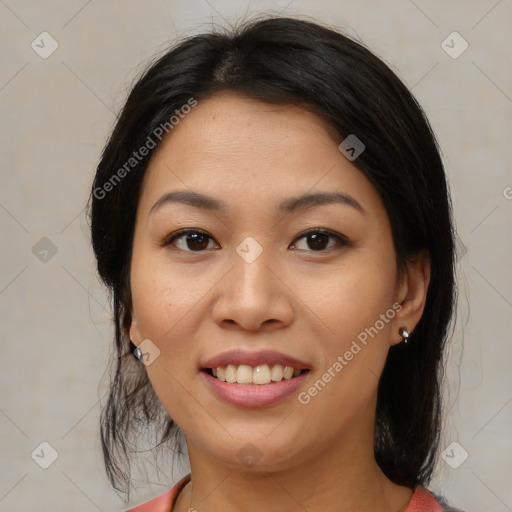 Joyful latino young-adult female with medium  brown hair and brown eyes