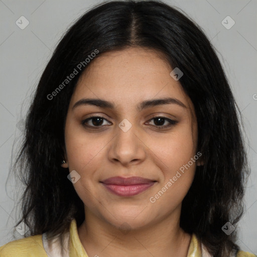 Joyful latino young-adult female with long  brown hair and brown eyes