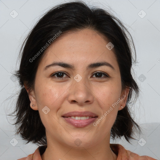 Joyful white adult female with medium  brown hair and brown eyes