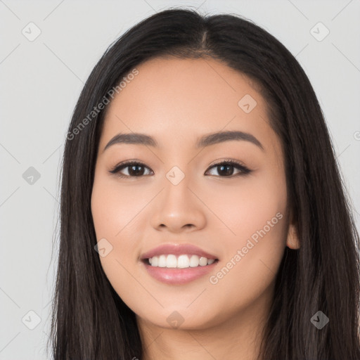 Joyful white young-adult female with long  black hair and brown eyes