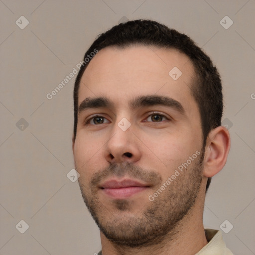 Neutral white young-adult male with short  black hair and brown eyes