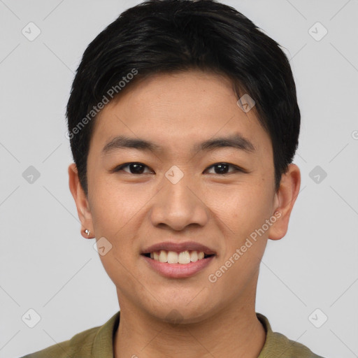 Joyful asian young-adult male with short  black hair and brown eyes