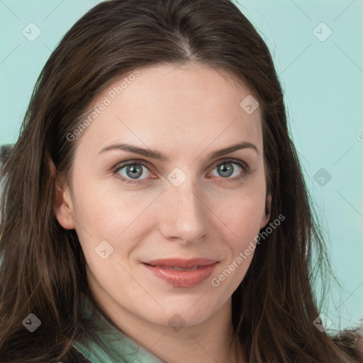 Joyful white young-adult female with long  brown hair and green eyes