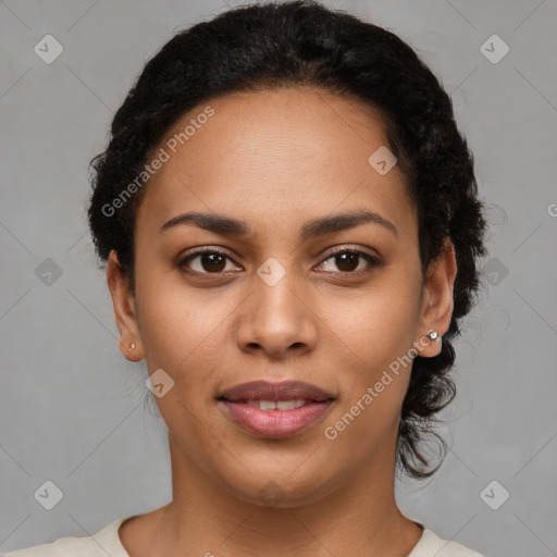 Joyful latino young-adult female with short  brown hair and brown eyes