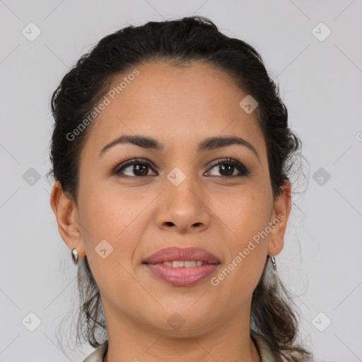 Joyful latino young-adult female with medium  brown hair and brown eyes