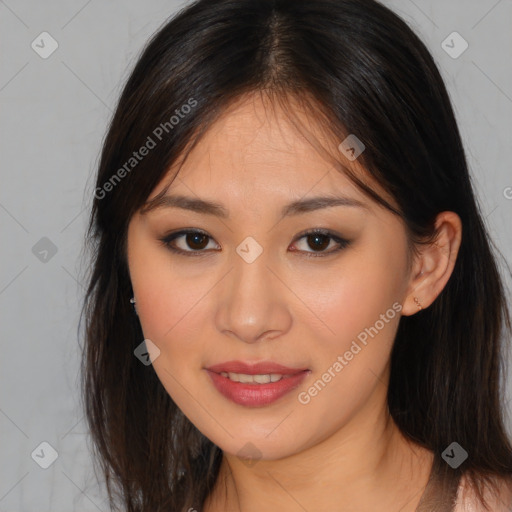 Joyful asian young-adult female with long  brown hair and brown eyes