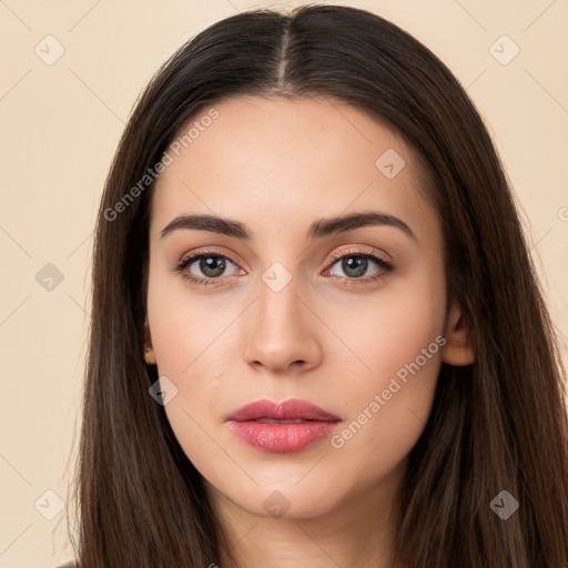 Neutral white young-adult female with long  brown hair and brown eyes