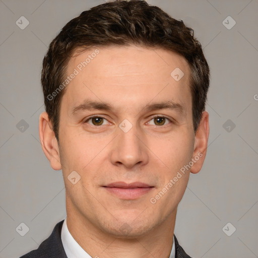 Joyful white adult male with short  brown hair and grey eyes