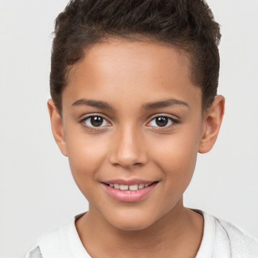 Joyful white child female with short  brown hair and brown eyes