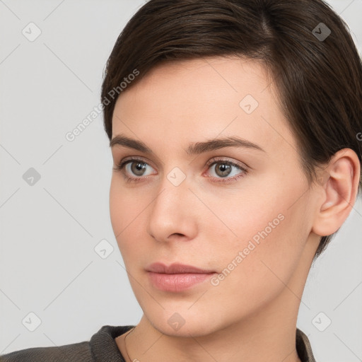 Neutral white young-adult female with short  brown hair and brown eyes