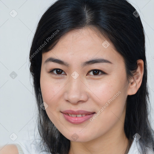 Joyful asian young-adult female with medium  brown hair and brown eyes