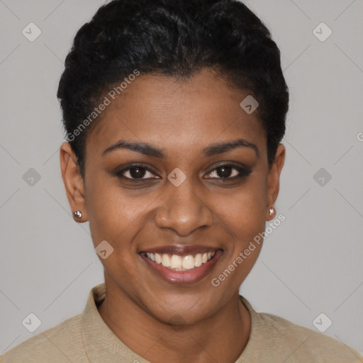 Joyful black young-adult female with short  black hair and brown eyes