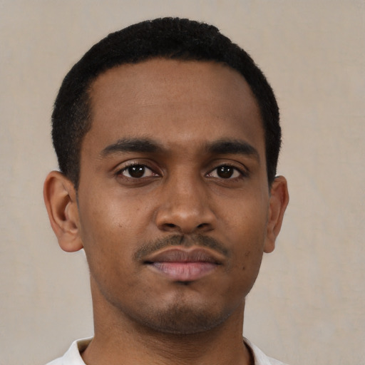 Neutral black young-adult male with short  brown hair and brown eyes