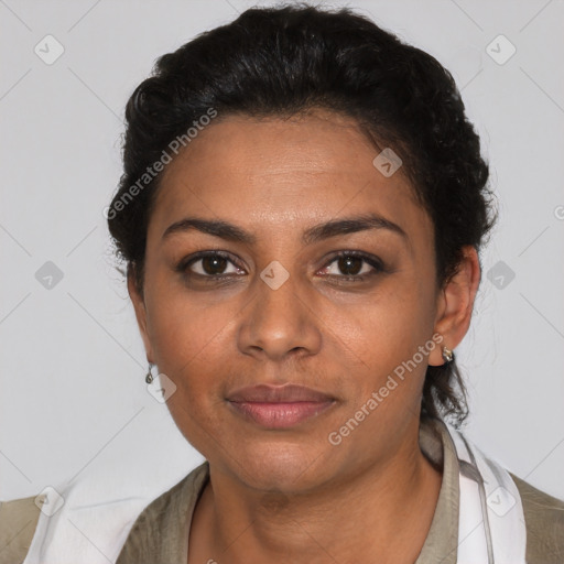 Joyful latino young-adult female with short  black hair and brown eyes