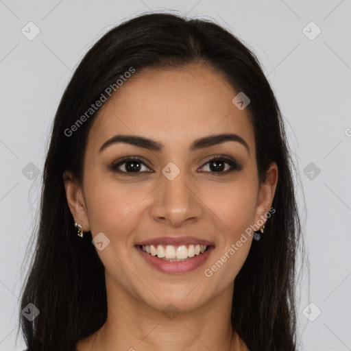 Joyful latino young-adult female with long  brown hair and brown eyes