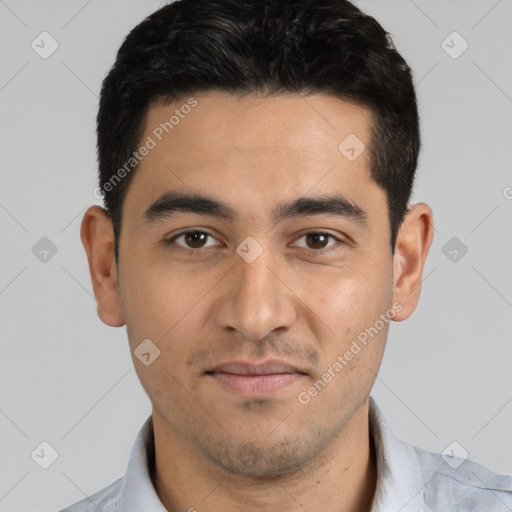 Joyful white young-adult male with short  black hair and brown eyes