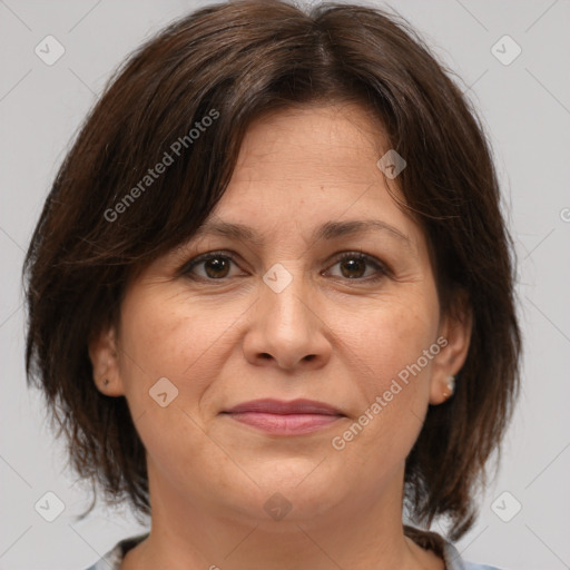 Joyful white adult female with medium  brown hair and brown eyes