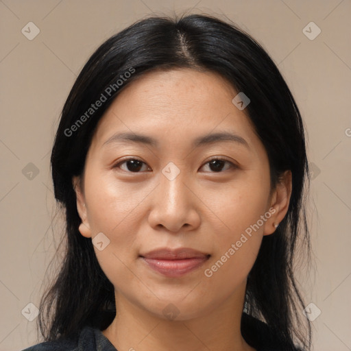 Joyful asian young-adult female with medium  black hair and brown eyes