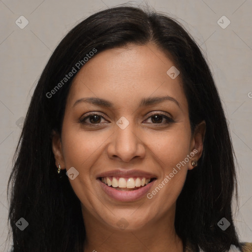 Joyful latino young-adult female with long  brown hair and brown eyes