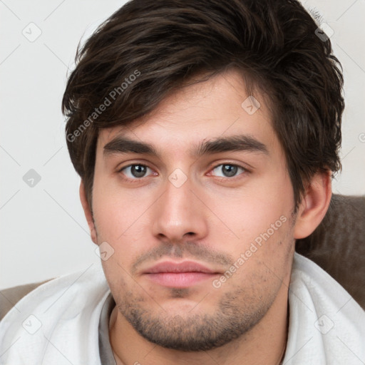 Neutral white young-adult male with short  brown hair and brown eyes