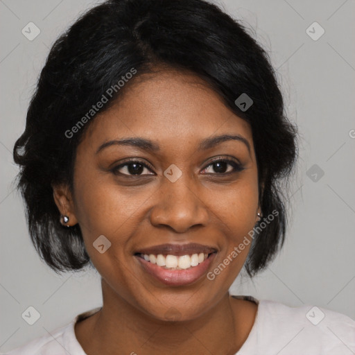 Joyful black young-adult female with medium  black hair and brown eyes