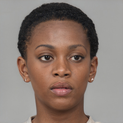 Neutral black young-adult female with short  brown hair and brown eyes