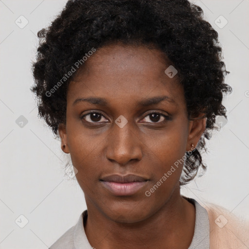 Neutral black young-adult female with short  brown hair and brown eyes