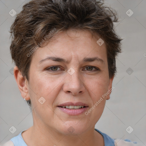 Joyful white adult female with short  brown hair and brown eyes