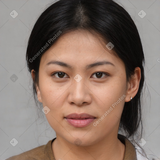 Joyful asian young-adult female with medium  brown hair and brown eyes