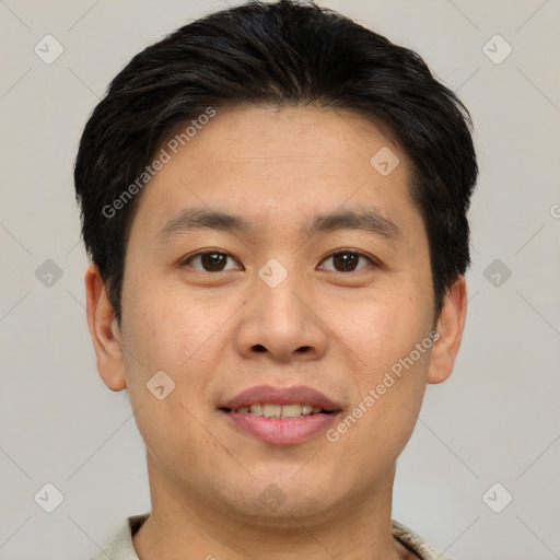 Joyful asian young-adult male with short  brown hair and brown eyes