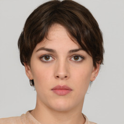 Neutral white young-adult female with short  brown hair and brown eyes