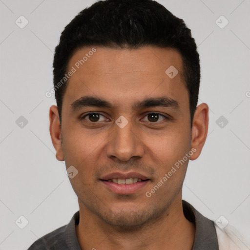 Joyful white young-adult male with short  black hair and brown eyes