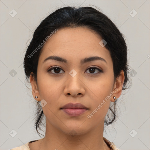 Joyful latino young-adult female with medium  black hair and brown eyes