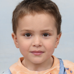 Joyful white child male with short  brown hair and brown eyes