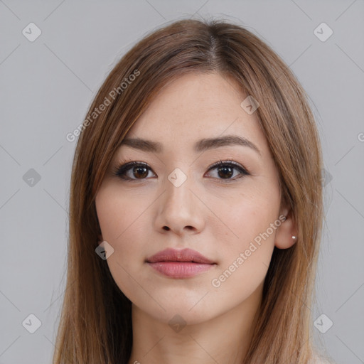 Neutral white young-adult female with long  brown hair and brown eyes