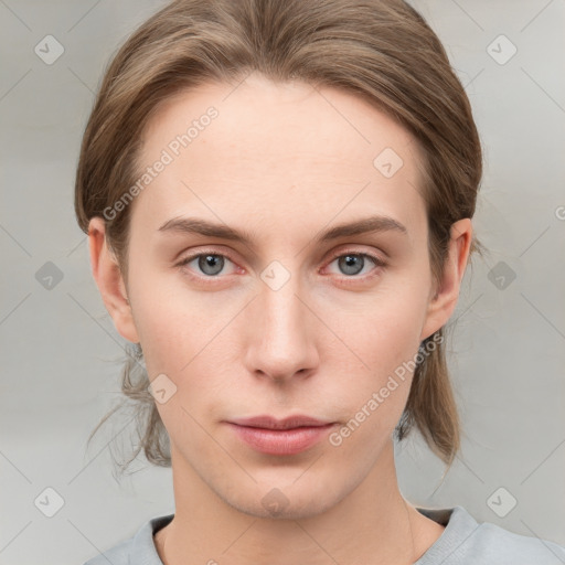 Neutral white young-adult female with medium  brown hair and grey eyes