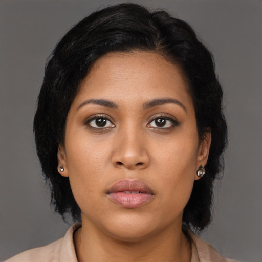 Neutral latino young-adult female with medium  brown hair and brown eyes