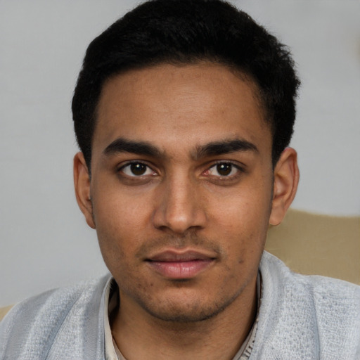 Neutral white young-adult male with short  black hair and brown eyes