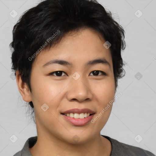 Joyful asian young-adult female with short  black hair and brown eyes