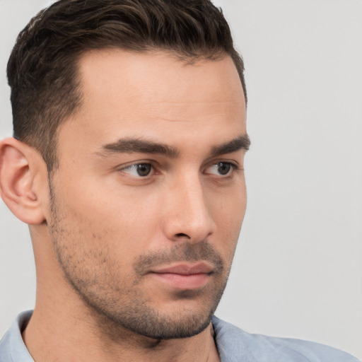 Neutral white young-adult male with short  brown hair and brown eyes