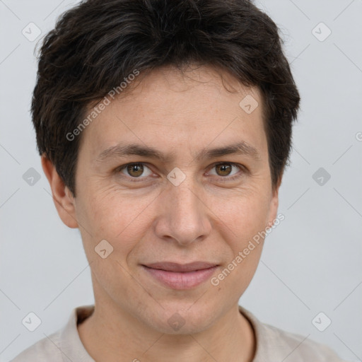 Joyful white adult female with short  brown hair and brown eyes